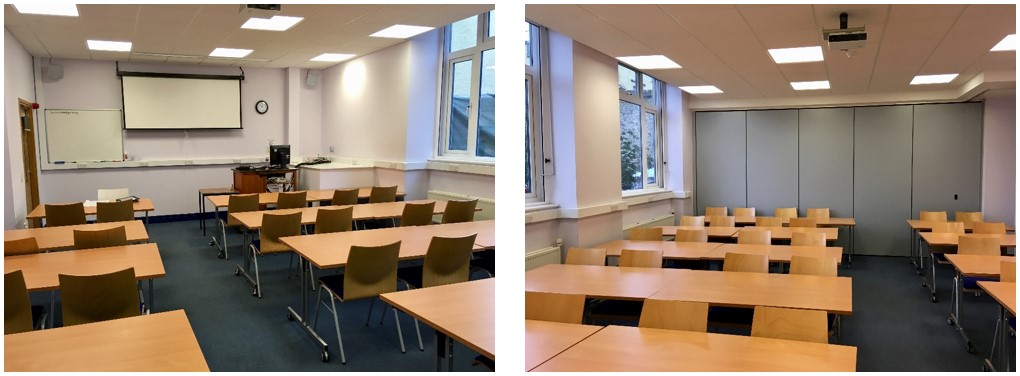 Classroom with rows of tables and chairs.